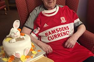 Billy James - dementia sufferer - with his MFC mementoes 