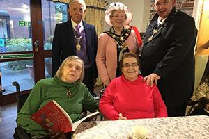 Residents at care home enjoying their Christmas fayre