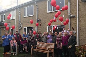 Care home’s remembrance ceremony - residents setting off balloons