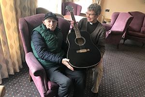 Guitarist Keith gets a special gift from pastor