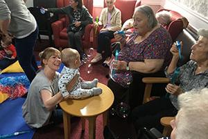 Baby yoga classes at care home