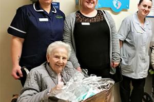 The Beeches Care Home deputy manager Rachel Harris, home manager Jess Brown and carer Amy Trattles with resident Janet Wren when they dropped off donations to the neonatal unit at University Hospital of North Tees on Random Act of Kindness Day.