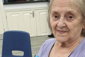 Elderly lady at social community group