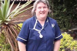 Clare Gingell - nurse at Hilton Nursing Home - posing for photograph in garden after bomb scare