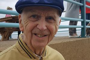 Elderly man reliving his childhood memories