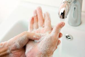Hand hygiene - a woman washing her hands